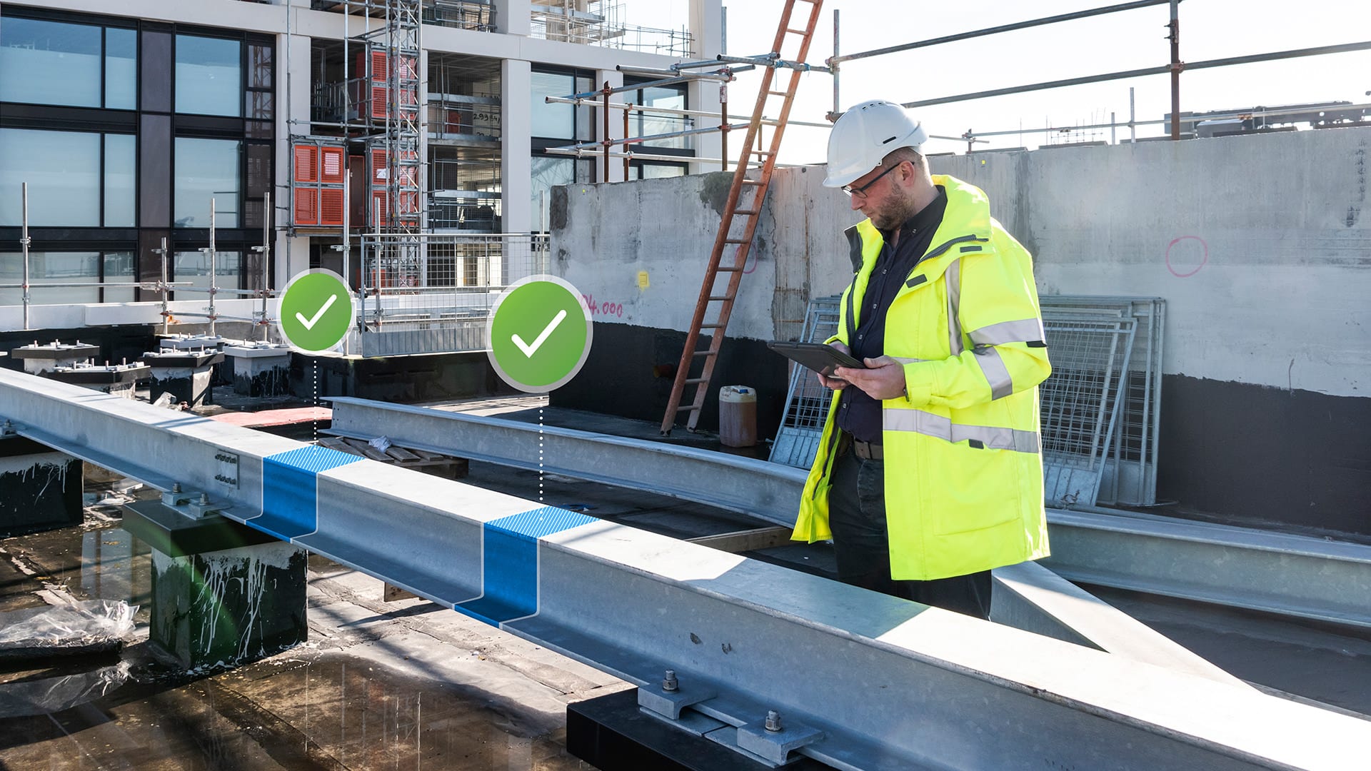  A quality control project manager wearing a hard hat and safety vest inspects a construction site using a tablet.